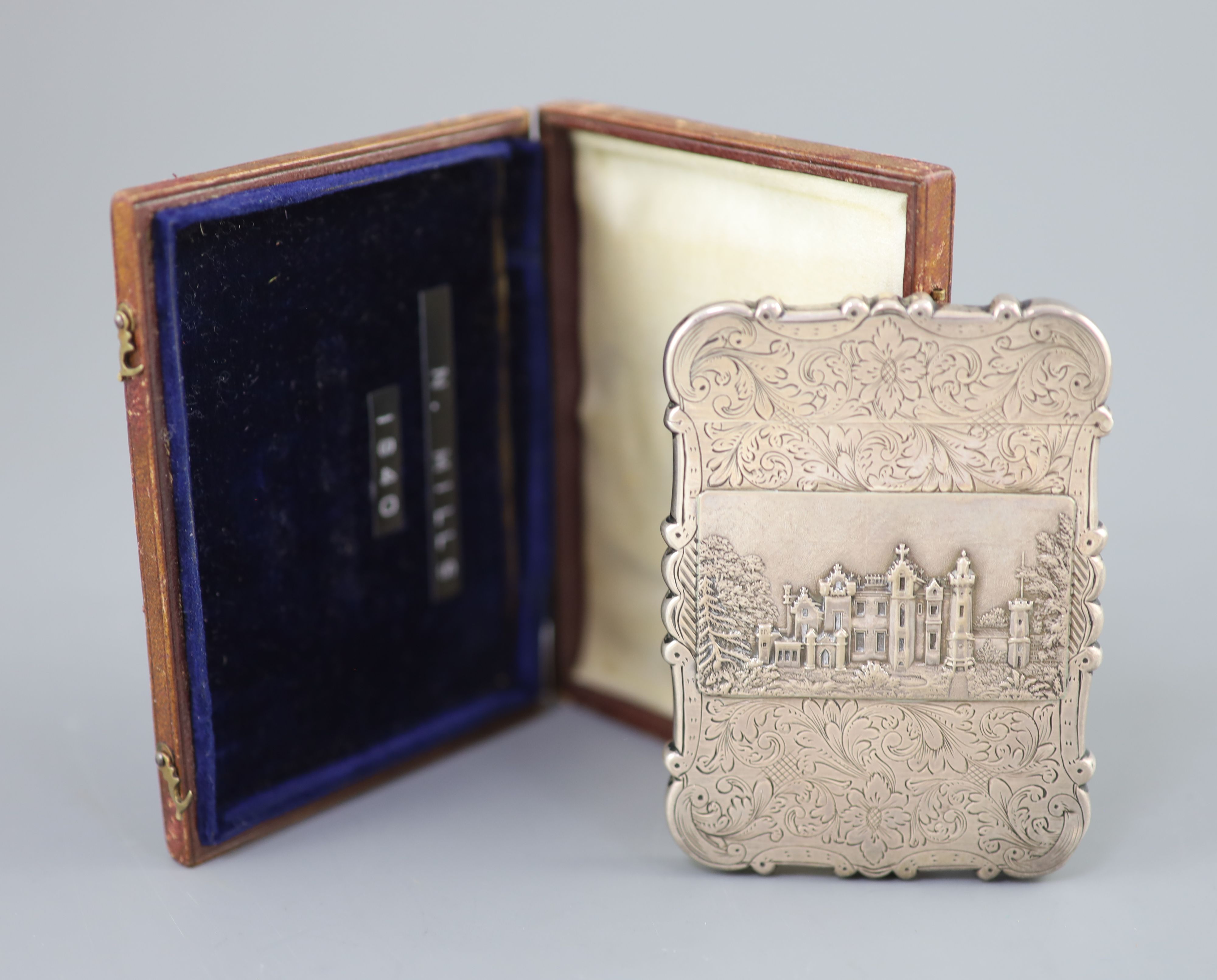 An early Victorian silver double sided castle top card case, depicting views of Windsor and Abbotsford castles,
